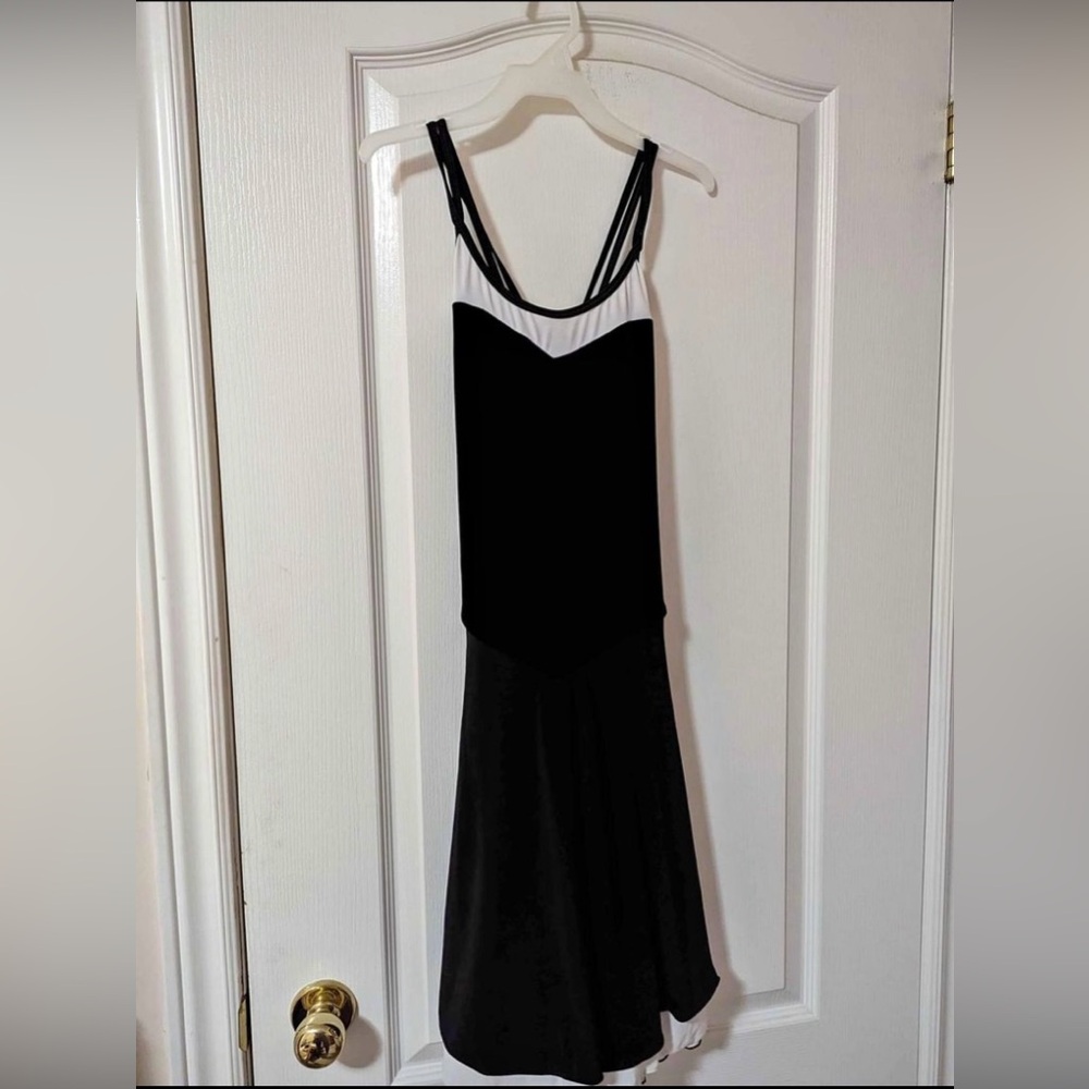 Black velvet dance dress white underskirt . Straps. Body built in size S-or M